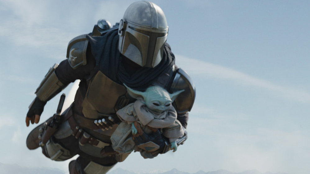 Mando fliegt mit Grogu