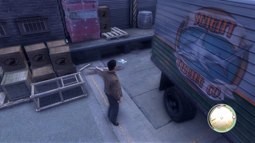 Kapitel 12 - Meeresgabe / Chapter 12 - Sea Gift: Auf dem Parkplatz der Fischfabrik: Das Heftchen liegt auf dem Pflaster, zwischen einem Lastwagen und der Laderampe.