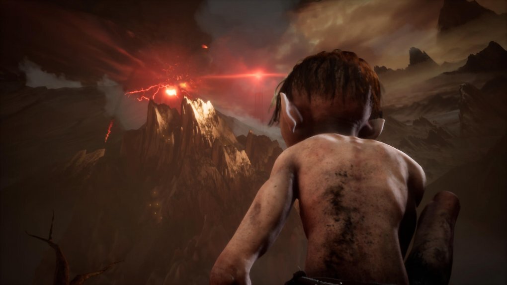 Gollum guckt in die Ferne auf einen Berg mit einem roten Licht.