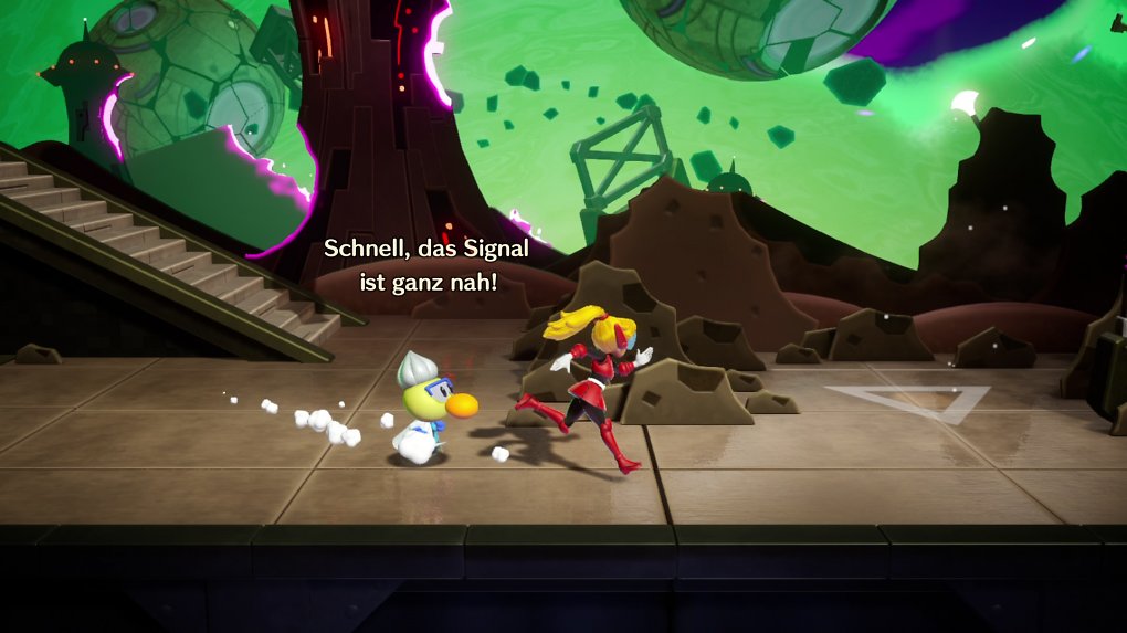 Superheldin-Peach läuft auf eine funkelnde Stelle zu, die mit einem Dreieck markiert ist