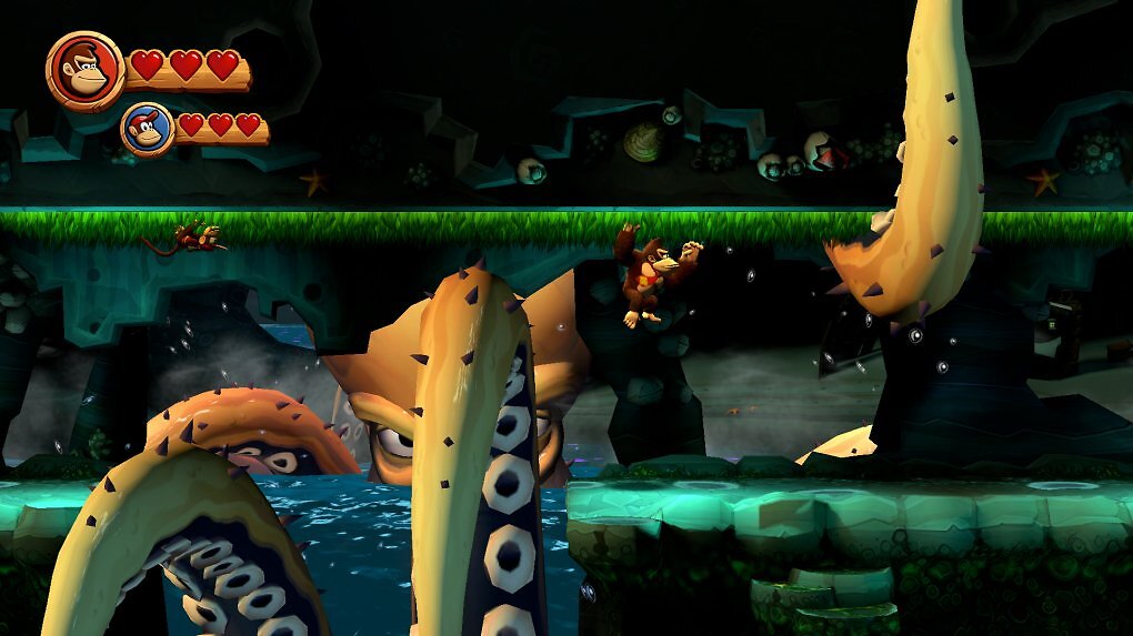 Donkey Kong springt vor einem Oktopus