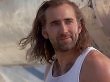 Nicolas Cage mit wehendem Haar.