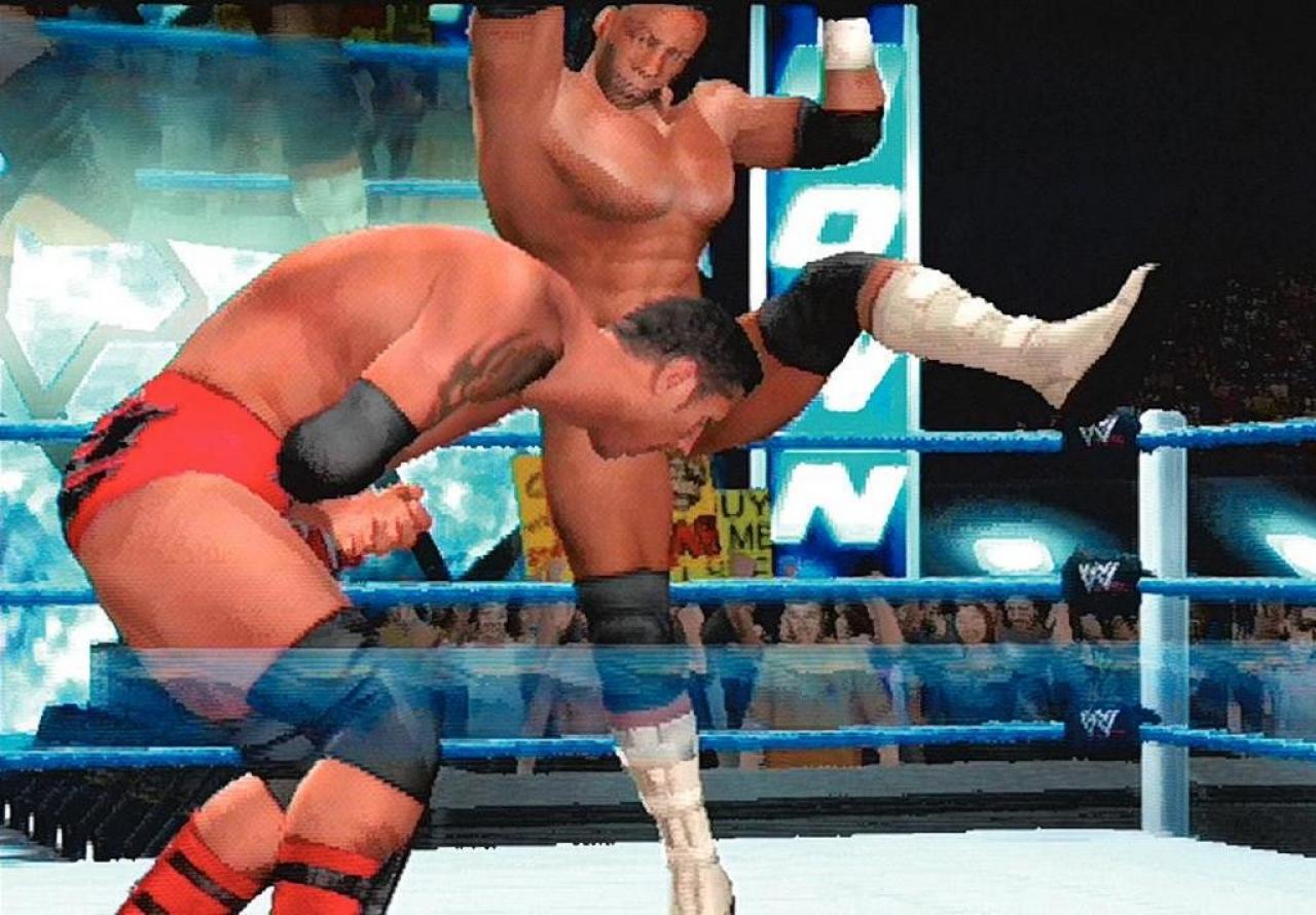 [10/11/2006] Finishing-Move: Mit dem Jump-Axe-Kick fertigt Booker seine Gegner ab. 