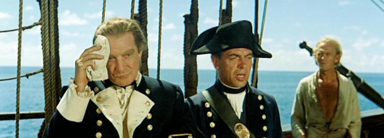 [22/01/2007] Der unmenschliche Captain Bligh (Trevor Howard, li.) beschwört den Zorn seiner Mannschaft herauf 