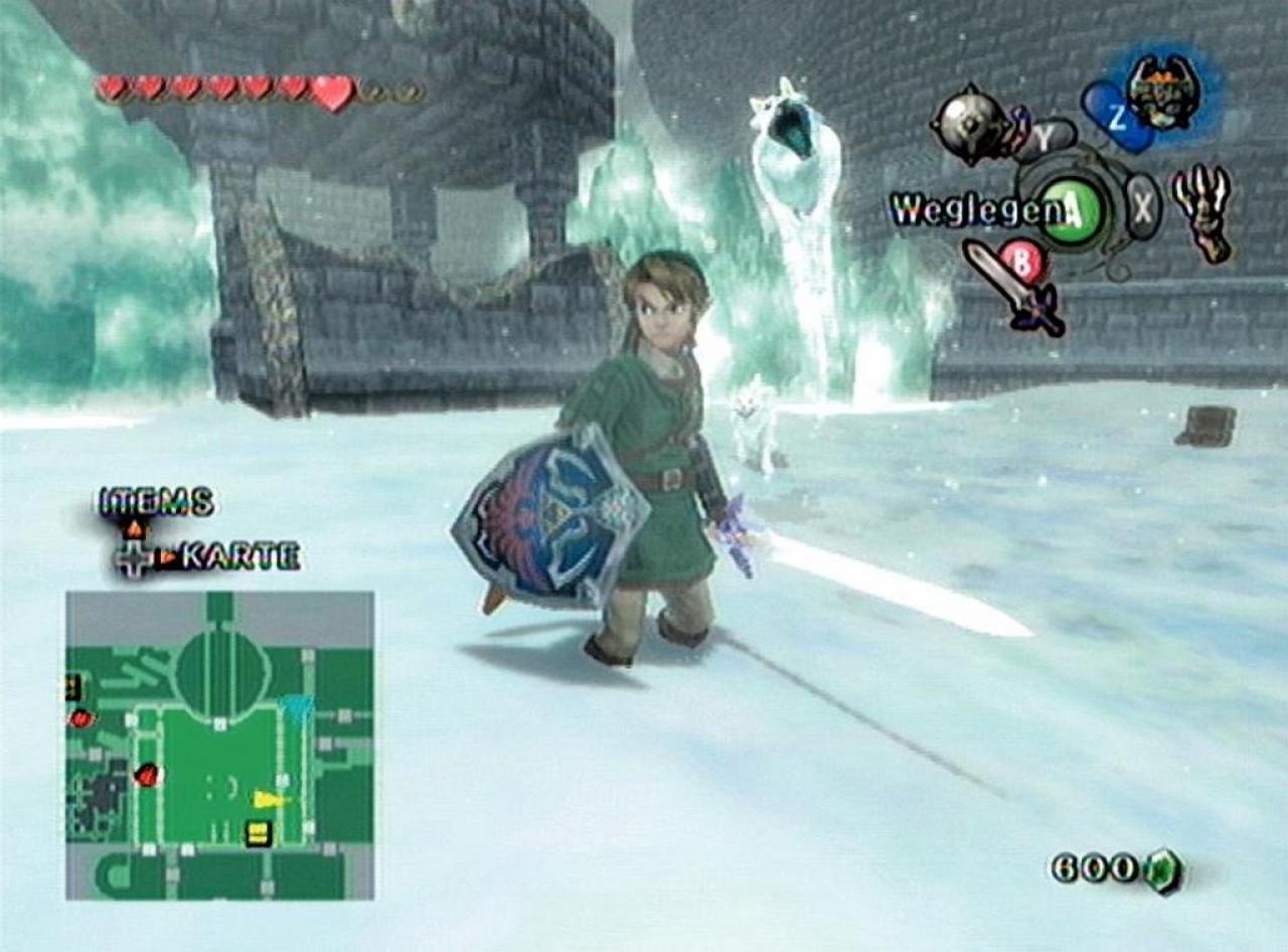 [18/01/2007] Eisige behausung: In der Bergruine stapft Link durch tiefen Schnee. Hier bemerkt er gerade nicht, wie von hinten Wölfe angreifen. (GameCube) 