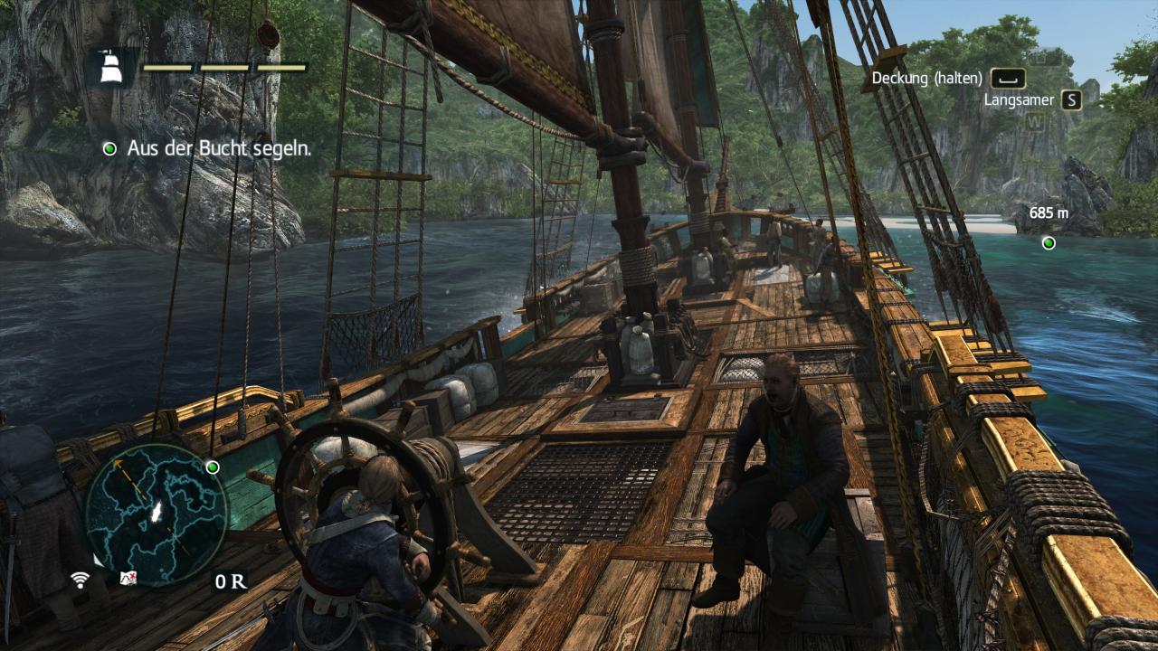 Auf dem Bild ist eine entspannte Segelfahrt über das azurblaue Karibische Meer zu sehen, bei der es an diversen Inseln und Küsten vorbeigeht-