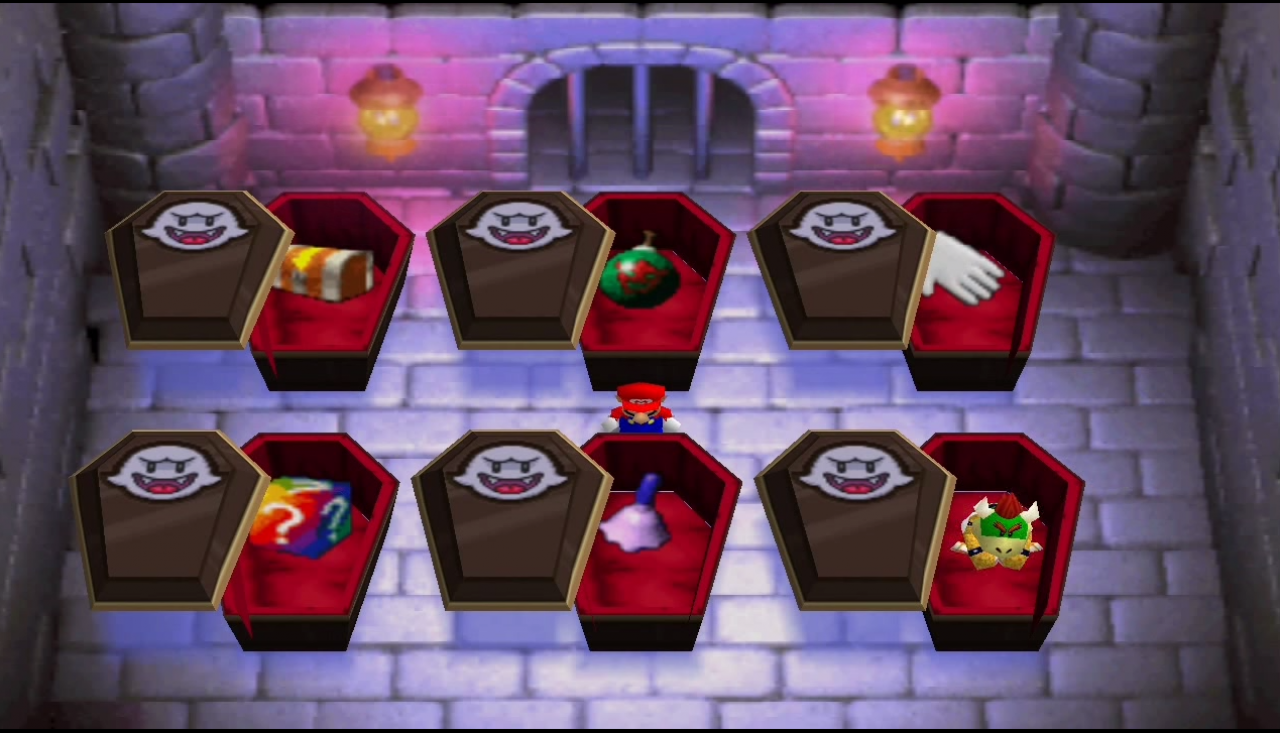 [06/11/2014] Ein kleines, sargiges Minigame haben wir in Mario Party 2. Diverses Zeug liegt in den Kisten und ganz nach der Art von Memory wird gemischt. Hoffentlich ziehen wir was Cooles aus dem auserwählten Sarg!