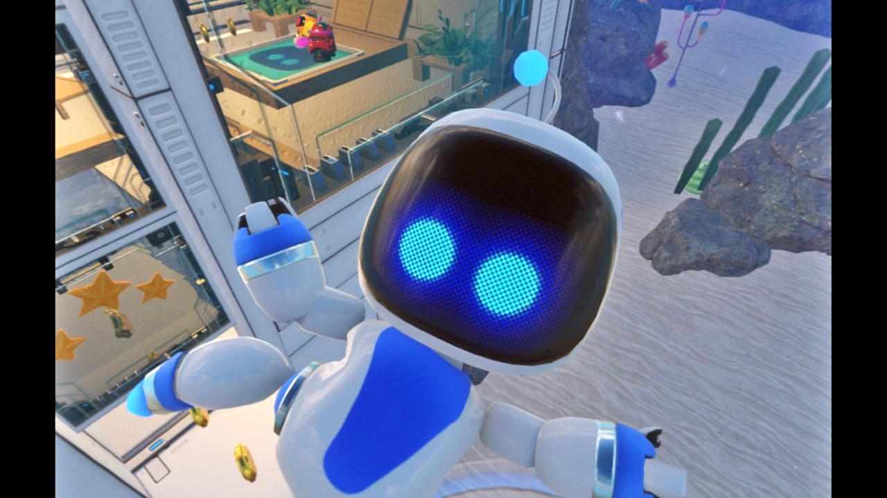 Ein kleiner Roboter klebt am Bildschirm und sieht einen an
