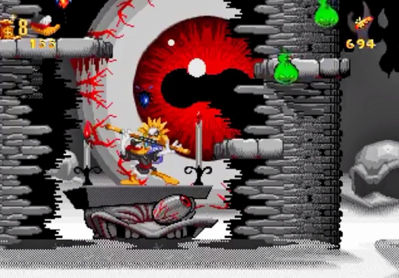 Ein großes, rotes Auge hinter einem Turm und Donald Duck