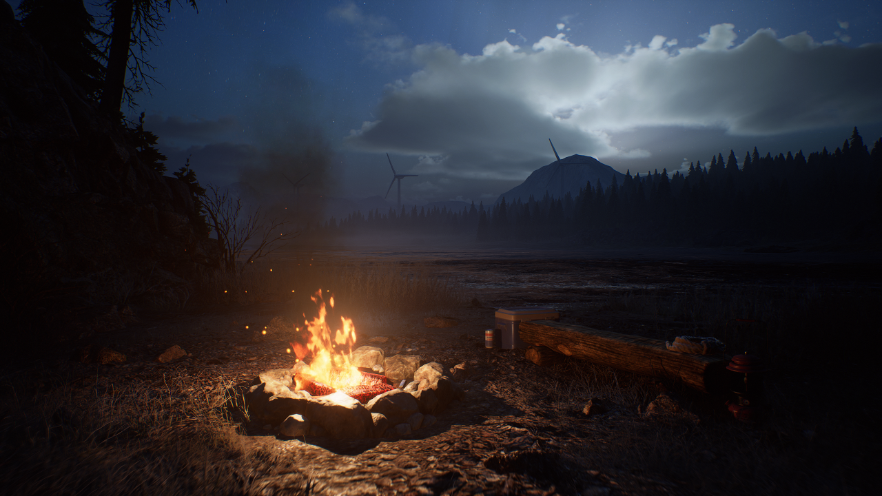 Lagerfeuer am Fluss in der Nacht