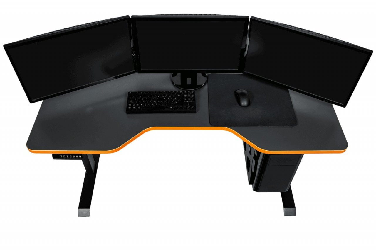 [07/05/2021] Ein LeetDesk Pro in Leet Orange mit allem Zubehör. durch den PC-Halter ist auch ein Betrieb von drei Monitoren kein Problem.