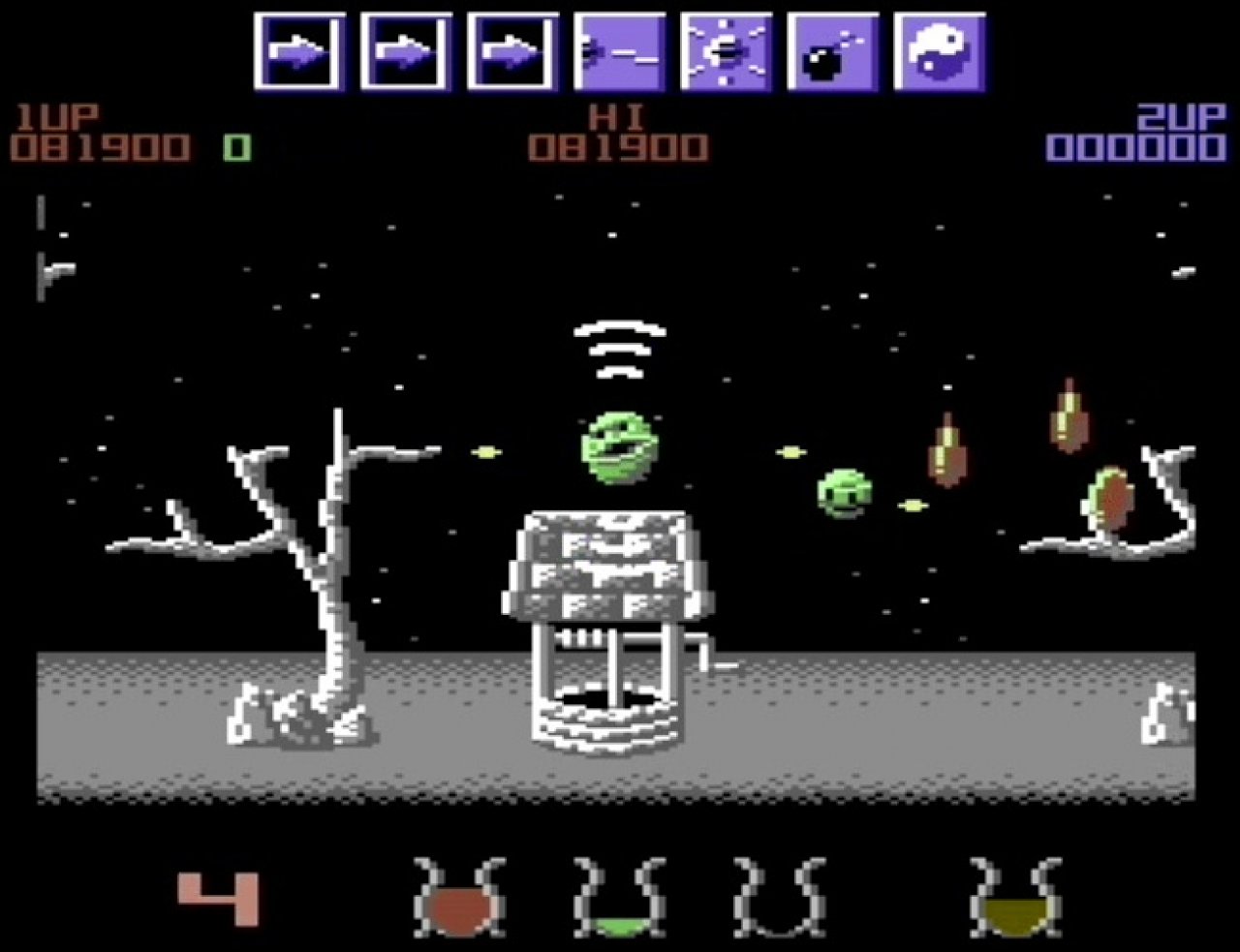 Ein grüner Ball fliegt durch ein düsteres Level von Wizball.