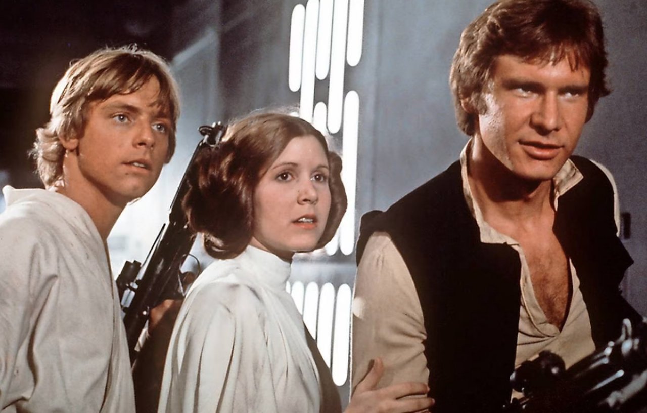 Mark Hamill, Carrie Fisher, Harrison Ford in Krieg der Sterne.