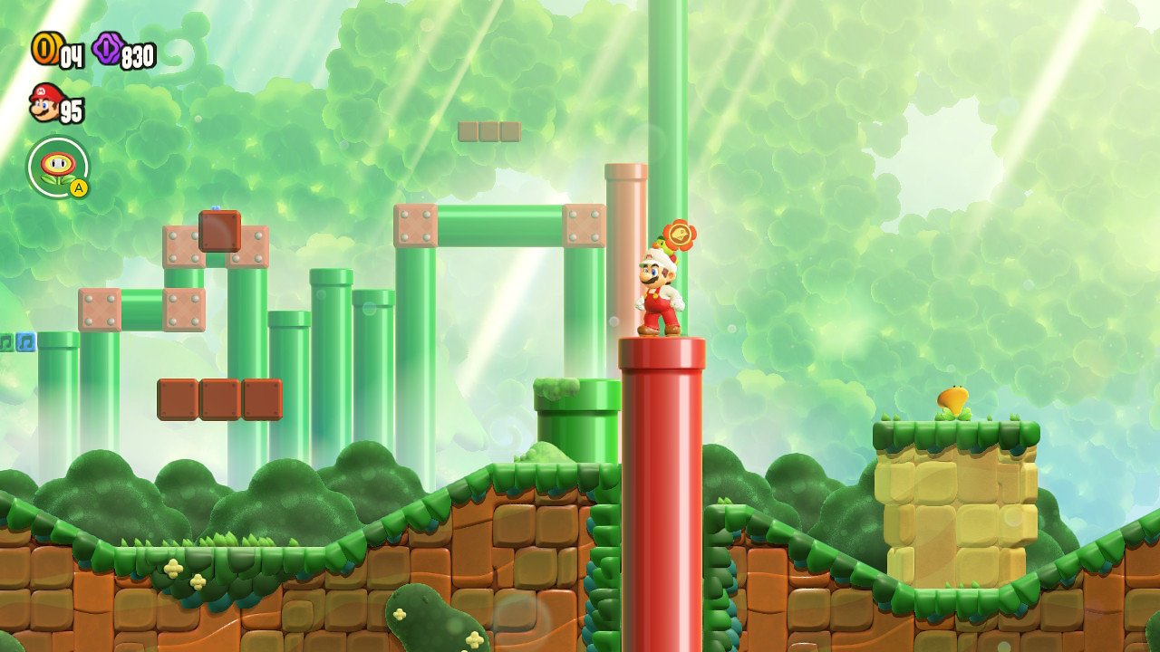 Mario, wie er auf der beschriebenen roten Röhre steht