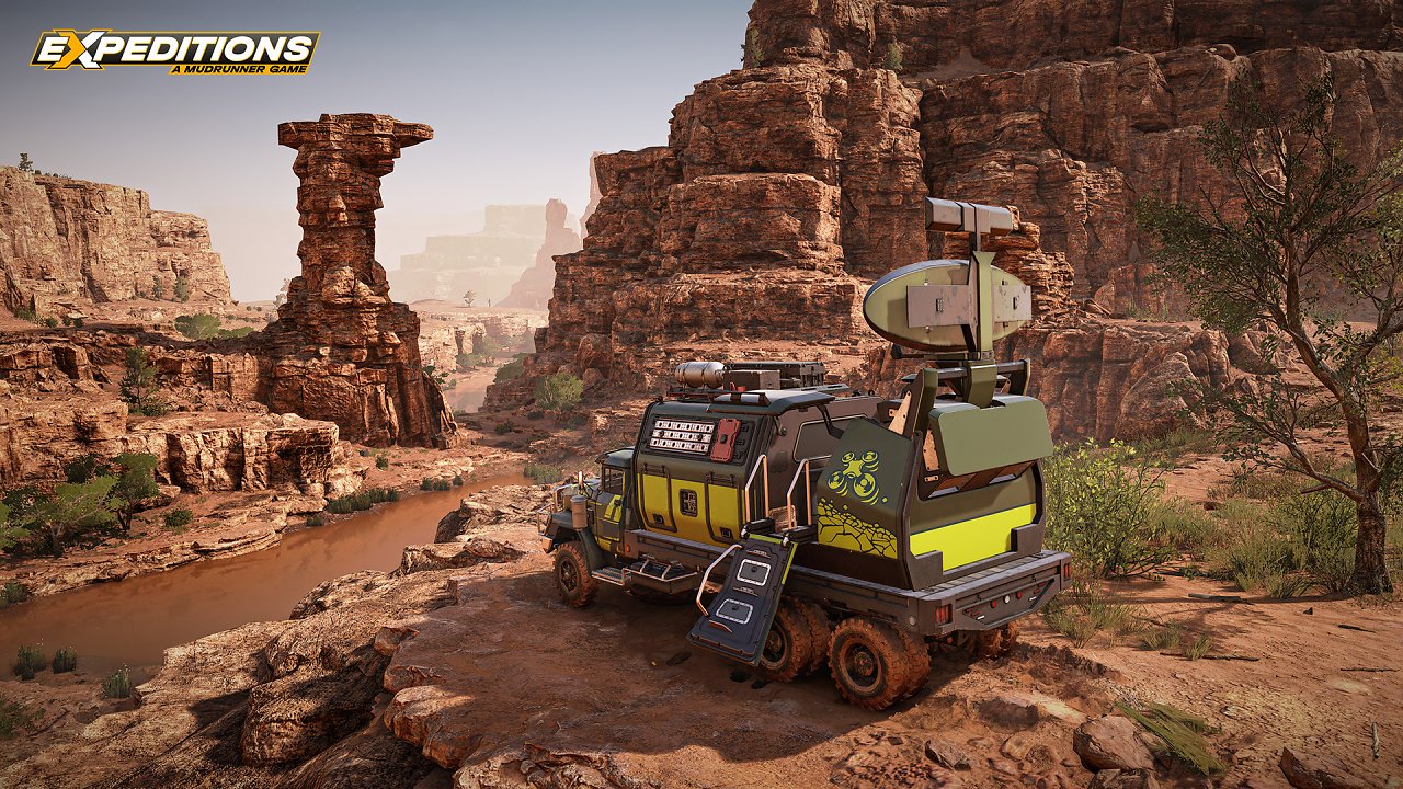 In der Canyon-Landschaft von Arizona steht ein Truck mit wissenschaftlichen Gerät auf der Ladefläche.