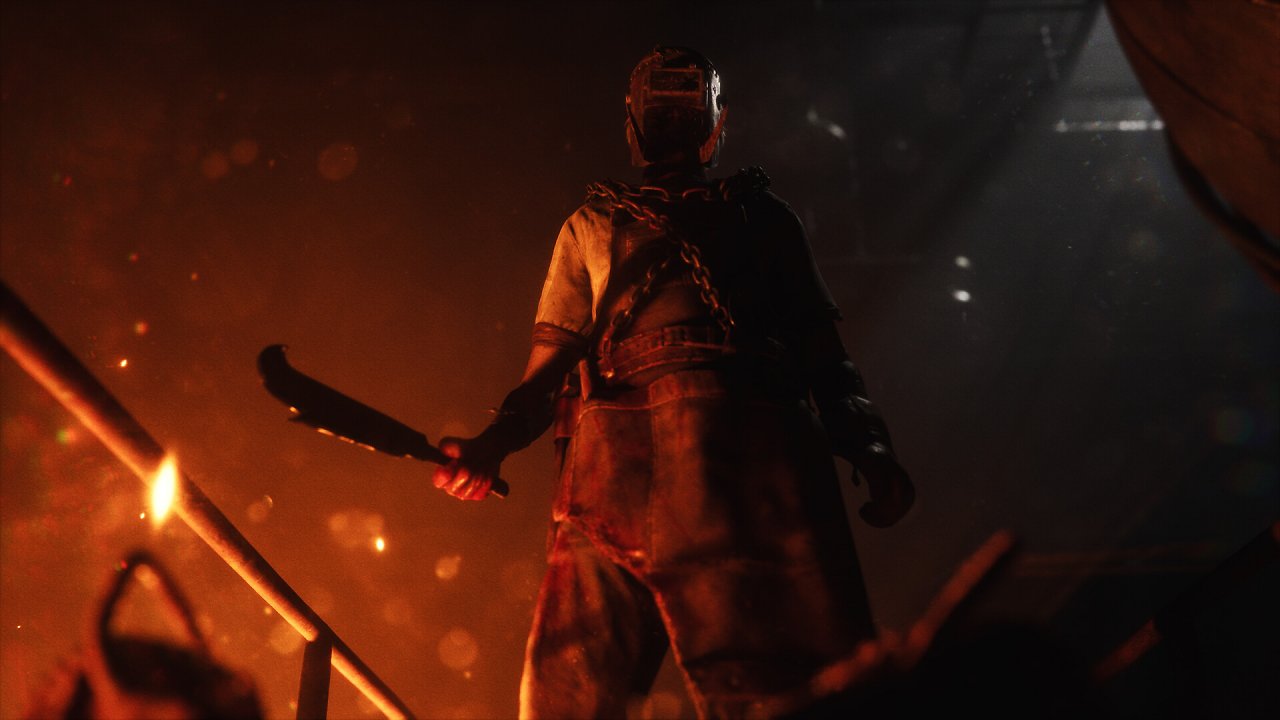 Ein Mann mit Schweißerhelm und einem Messer in der Hand schaut auf den Boden