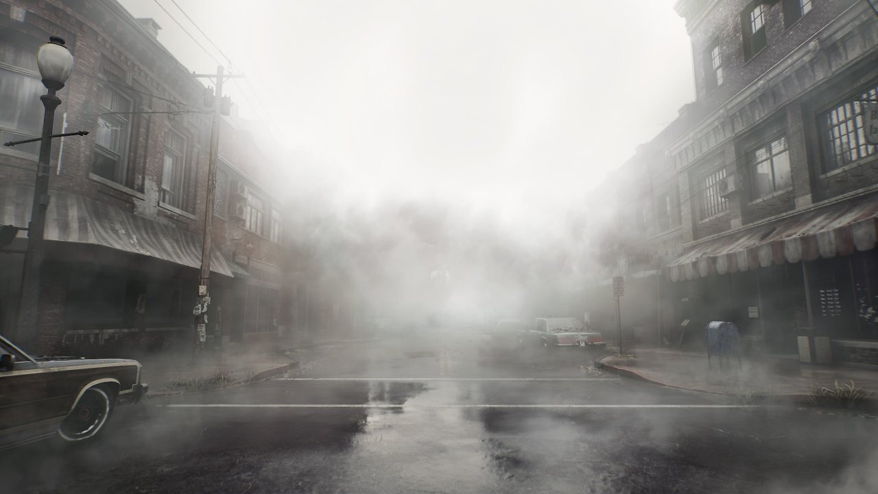 Eins Straße, links und rechts Häuserreihen voll dichtem Nebel.