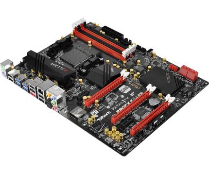 Beispiel ASRock Fatal1ty 990FX Killer: oben die vier RAM-Slots in rot und schwarz, direkt benachbart der quadratische CPU-Sockel. Links die zahlreichen Anschlüsse, die später an der Gehäuserückseite liegen.