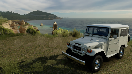 Und noch ein Schnappschuss - diesmal mit einem alten Toyota Landcruiser vor der traumhaften Kulisse des Strandes von Byron Bay.
