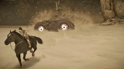 Reiter vor dem Sand-Koloss weg und zielt auf seine Augen mit Pfeil und Bogen.