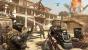Call of Duty: Black Ops 2 Revolution Preview - Vor einem von einem Sandsturm verwüsteten Hotel auf der Karte Mirage verteidigen wir einen Kontrollpunkt, während unsere Gegner uns auf dem Boden und aus der Luft angreifen.