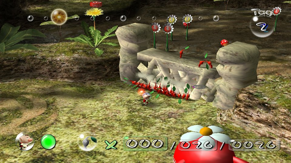 Rote Pikmin beseitigen eine Barrikade.