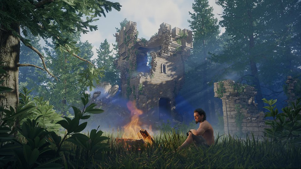 Ein Flameborn ohne Rüstung sitzt in einer Burgruine am Lagerfeuer.