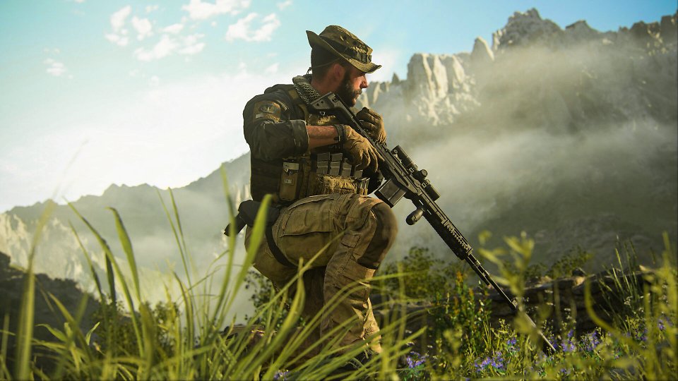 Captain Price kniet in hohem Gras